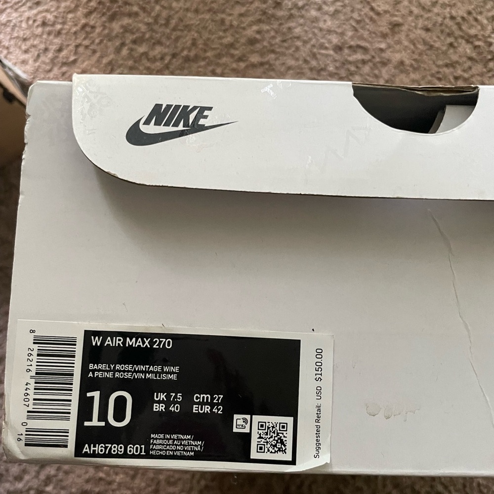Never worn before, pink color, women’s size 10 Nike Air Max.